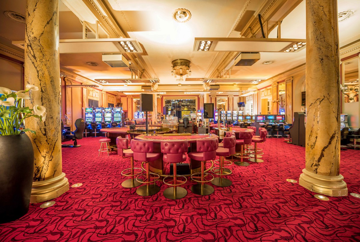 Grand Casino Luzern interior with modern table games and bar lighting