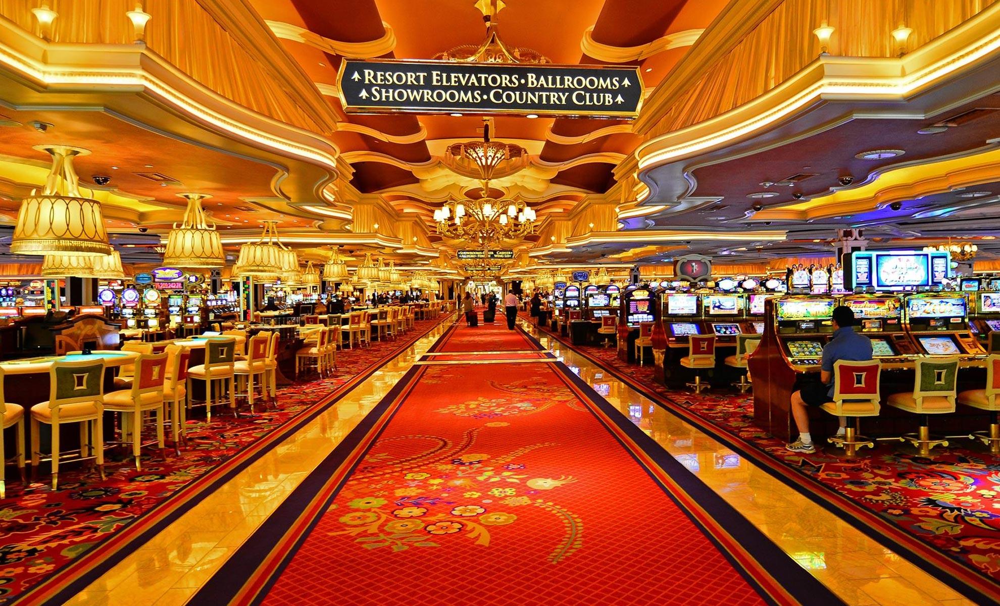 Wynn main gaming corridor with table games and slot machines